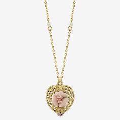 A lovely vintage-inspired accessory that adds a charming touch to any occasion. Featuring a gilded filigree heart pendant with a pink rose made of genuine porcelain and a pink crystal accent which hangs upon a gold-toned chain. Small, delicate faux pearls decorate the chain and complete the look.Pearl Type: Simulated PearlsJewelry Closure: Lobster ClaspShape: Heart, FlowerStone Cut: RoundMetal Color: Gold ToneChain Length: 16 InchExtender Length: 3 InchPendant Length: 25mmPendant Width: 20mmChai Charming Gold Flower Pendant Jewelry, Gold Flower Necklace With Vintage Charm, Vintage Heart Necklace For Mother's Day, Vintage Heart Pendant Charm Necklaces For Mother's Day, Vintage Charm Heart Pendant Necklace For Mother's Day, Vintage Heart Pendant Charm Necklace For Mother's Day, Mother's Day Heart Pendant Necklace With Vintage Charm, Mother's Day Vintage Charm Heart Pendant Necklace, Antique Gold Heart Necklace With Vintage Charm