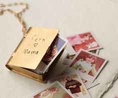 This personalised photo locket necklace opens out to reveal lots of tiny Polaroid photographs! We will also engrave a sample of any handwriting on the front of the locket as an extra, special touch! ★ HANDWRITING ON LOCKET FRONT IS INCLUDED WITH ALL LOCKETS AS STANDARD. EXTRA ENGRAVING IS ALSO AVAILABLE INSIDE THE LOCKET (AS PICTURED) ★ We take care of editing, printing and cutting your personal photographs into tiny vintage polaroids which fit perfectly and snugly into the locket. This would ma