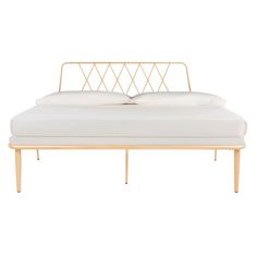 the bed frame is made from wood and has white sheets