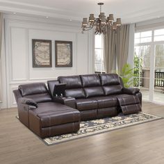 a living room filled with furniture and a chandelier