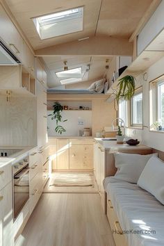 the interior of a tiny home with wood flooring