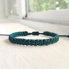 Handwoven W/ Teal Blue Waxed Polyester Thread In A Macrame Square-Knot Pattern. This Bracelet Is Sturdy & Water-Proof, Perfect For Wearing All Day, Everyday & For Layering With Other Bracelets! Finished W/ A Secure Sliding Knot. : Adjustable Knot! (Fits 5 In. To 8.5 In. Wrist) #: Handmade Bracelet Boho Romantic Goth Fairy Grunge Jewelry Gypsy Stackable Bracelet Dainty Minimalist 90s Y2k 2000s Vintage Retro Jewelry Surfer Beach Coconut Girl Granola Girl Jewelry Bracelet Friendship Gift Cutecore K 90s Bracelets, Granola Girl Jewelry, Fairy Grunge Jewelry, Macrame Square, Minimalist 90s, Macrame Square Knot, Knot Bracelets, Beach Coconut, Goth Fairy