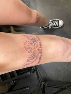 a woman's arm with a tattoo on it and an elephant in the center