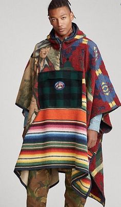 Introducing the limited edition Polo Ralph Lauren Sportsman Patchwork Hooded Poncho, a must-have for any fashion-savvy man out there. This unique piece is perfect for those who want to stand out from the crowd and make a statement. The poncho features an Aztec-inspired theme, with a multicolor patchwork design that is guaranteed to turn heads. Made from high-quality wool, this pullover-style poncho is soft, warm, and comfortable. It comes with a hood for extra protection against the elements, and boasts a stylish logo accent that adds to its overall appeal. Whether you're dressing up or down, this piece is sure to be a versatile addition to your wardrobe. Advanced Style Boho, Patchwork Trends, Nomad Clothing, Poncho Men, Poncho Outfit, Poncho Coat, Stylish Logo, Hooded Poncho, Polo Sport Ralph Lauren