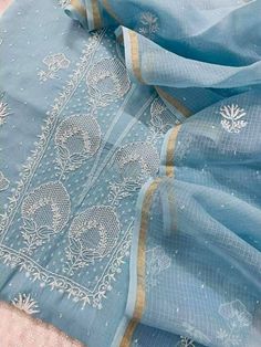 Item Overview ATHARVA Hand Embroidery Salwar Kameez Light Blue/Lucknowi Chikankari/Kota Doria Dupatta/Custom Stitch Unstitch/Custom Anarkali/Gift/ Dno. LUCK08 Fabric: * Shirt: Chanderi Silk- Lucknowi Chikankari Embroidery on Neck and All over Jaal/ 2.5 Mts Beautiful Hand Embroidery * Dupatta:Kota Doria Embroidery Dupatta 2.5Mts/All over Embroidery/ Lucknowi Chikankari * Bottom Santoon Silk 2.5 Mts. *Anarkali Style - - Increased Embroidery All Over the Panel -4.5Mts to 5 Mts Shirt Fabric used -4. Blue Anarkali Set With Zari Work For Transitional Season, Transitional Blue Anarkali Set With Zari Work, Blue Resham Embroidered Anarkali Set For Navratri, Blue Anarkali Set With Resham Embroidery For Navratri, Designer Blue Cutdana Kurta, Blue Sharara With Zari Work For Transitional Season, Blue Anarkali Kurta With Dupatta, Festive Blue Chanderi Anarkali Set, Blue Anarkali Set With Straight Kurta For Festive Occasions