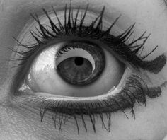 a woman's eye with long eyelashes