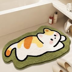 a bathroom rug with a cat on it