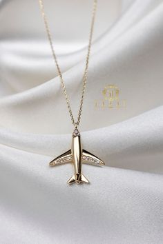 "ABOUT PRODUCT This 14K Gold Airplane  necklace is beautifully designed and hand crafted with our associates to make this a special gift for your loved ones. Knowing the value of our customers, We prepare each piece with extra care and attention.  ITEM DETAILS Material: 14K Gold Approx: 2,1 grams with the chain. Only pendant is 1,6 grams. Available colors: Gold, Rose Gold, White Gold Available Sizes: 14\" to 20\" ✪ 14k Solid Gold ( Certification will be included with your order ) ✪Available 14K Luxury Custom Sterling Silver Necklace As Gift, Modern Sterling Silver Diamond Necklace Gift, Luxury Handmade Custom Necklace For Gift, Gift Diamond Necklace With Pendant Polished Finish, Diamond Pendant Necklace With Polished Finish For Gift, Polished Finish Diamond Pendant Necklace For Gift, Luxury Polished Finish Necklace As Gift, Polished Finish Diamond Pendant Necklace Gift, Luxury 14k Gold Necklaces For Gifts