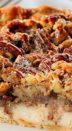 a slice of pecan pie on a white plate