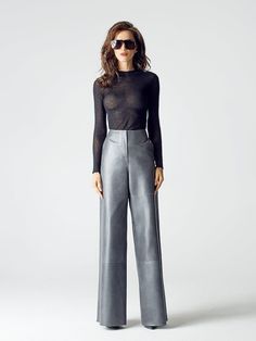 These graphite grеy leather pants are a great accent to any woman's wardrobe. It will refresh your everyday style. A suitable choice, both for formal meetings in the office and for coffee with friends after work. Italian pockets add sophistication to the design, and the high waist emphasizes the feminine silhouette line, providing exceptional comfort and visual lengthening of the legs. The graphite gray color makes the pants versatile and easy to combine. Details: Grey color * High-waisted long Gray Leather Pant, Grey Leather Pants, Leather Pants Wide Leg, Wide Leg Leather Pants, Palazzo Trousers, Pantalon Large, Pants Wide Leg, Woman Fashion, Style Expert