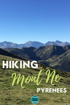 the words hiking mean me pyrnesss on top of a grassy hill with mountains in