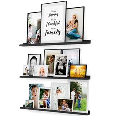 three black shelves with pictures and family photos on them