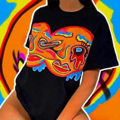 Abstract Melting Faces Graphic T-Shirt An original hand drawn graphic design by Mikiko! 👁 FREE WORLDWIDE SHIPPING 👁 Unisex t-shirts available in sizes  - Small - Medium - Large - XL - XXL (other sizes can be made upon request) - Black heavy cotton t-shirt - Ethically and sustainably manufactured - Artwork is professionally printed - no cracks or peeling - High quality heavy tee with a taped neck and sleeves - Authentic artwork - Machine wash inside out for best results (Hand-wash works even be Melting Face, 80s Y2k, Beige Tote Bag, Design Movements, Black Graphic Tees, Rave Festival, Trendy Shirts, Vintage Tee, Great T Shirts