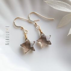 Smoky quartz star crystal earrings, April birthstone earrings, 10th Anniversary gift, Star earrings, Celestial earrings, Virgo zodiac jewelry ◦ All of the stones used in our jewelry are 100% genuine. These smoky quartz stones are expertly cut and shaped into a star ◦ Comes on your choice of 925 sterling silver or 14m gold filled ear hooks which are comfortable for all-day wear and great for sensitive ears ◦ Each stone varies in size (typically 10x10mm), shape, and color so please do expect some Star-shaped Earrings With Lever Back For Gifts, Star-shaped Crystal Earrings For Gifts, Smokey Quartz Jewelry, Smoky Quartz Earrings, 10th Anniversary Gifts, Star Crystal, Celestial Earrings, Earrings Star, Sacred Stones