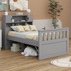 a bedroom with a bed, dresser and bookcase in grey color scheme on the floor