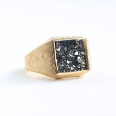 KEANU PYRITE SIGNET RING Stunning signet ring with pyrite crystal. DETAILS  Gemstone: pyrite Band width: approx. 14mm on the front  Finish: Polished
   Material:14k Gold: yellow, white, rose  18k Gold: yellow, white, rose  Other Metal: platinum  Sizing: We are using US metric system   CUSTOMIZATION OPTIONS This design can be made with gemstones of your choosing. If you would prefer a custom ring, please contact us before purchase. PROCEDURE INFORMATION Please select the material and ring size from the drop-down menu on the right side of the listing.
  SHIPPING INFORMATION Free Insured Shipping: The item will be gift wrapped and shipped with insured express shipping from Europe. Gemstone Rings Unique, Jewelry Room, Pyrite Ring, Bloodstone Ring, Mens Pinky Ring, Seersucker Suit, Mens Gemstone Rings, Metric System, Signet Ring Men