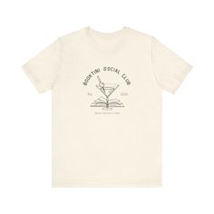 Join the Booktini Social Club with this unique tee, a Book Club with a Twist! Perfect for book lovers who enjoy a little twist with their reading.  Product Features - Made with 100% lightweight Airlume combed and ring-spun cotton - Shoulder tape for stability and to prevent stretching - Ribbed knit collar for shape retention - Side seams for garment's shape support - Tear-away label for minimized skin irritations Care Instructions - Machine wash: cold  - Tumble dry: low heat - Iron, steam or dry Reading Gifts, Club T Shirt, Social Club, Knit Collar, Book Lover, Book Club, Product Features, Book Lovers, Ribbed Knit