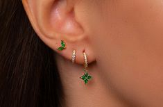 ✨Emerald Gold- Plated Silver Hoop Earring Set. This Stacking Earring Set is perfect for everyday wear, or a beautiful gift for a special lady! :) ✨Product specifications:  * Material: Sterling silver with Zircon  * Hoops Diameter (inner): 7mm.  * Hoops width: 2mm. *Stud:4mm. ✨✨FREE PERSONALISED GIFT POUCH WITH EVERY ORDER Select a gift pouch colour (lilac or cream - refer to the last photo for guidance) and make it your own by adding up to 10 letters or numbers as a personal touch. I will gladly include a gift message. ✨Shipping:  * All orders will be shipped out within 1 business day after receiving the order.  *UK delivery aim: 1-2 working days *Europe delivery aim: 3-5 working days  *Worldwide delivery aim: 5-7 working days  (weekends excluded) ✨Care instructions: * Avoid contact with p Green And Silver Earring Stack, Green Earring Stack, Earring Stacks Silver, Piercing Stacking, Triple Piercing Earrings, Hoop Earring Stack, Stacking Earring, Hoop Earring Set, Earring Stack