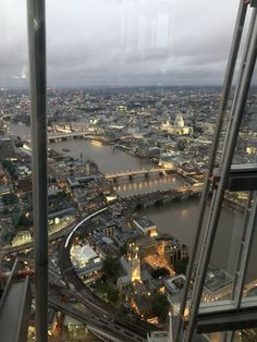 an aerial view of the city at night from a high rise observation platform in london