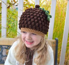 This crochet pattern comes with complete instructions and illustrations for this adorable Acorn or Pine Cone Hat, make one up just in time for Thanksgiving or Christmas. The pattern is for newborns up to adult.  Skill Level: Intermediate Stitches Used:  Chain, Single, Half Double, Double,Puff Stitch (tutorial included for puff stitch), Slip Stitch Materials Needed: Size I (5.5mm) Crochet Hook Yarn Needle / Scissors Worsted Weight Yarn If you love this design and would like to stay up to date, kn Crochet Squirrel, Acorn Hat, Crochet Character Hats, Crochet Holiday, Hat Crochet Pattern, Bonnet Crochet, Festival Hat, Childrens Hats, Puff Stitch