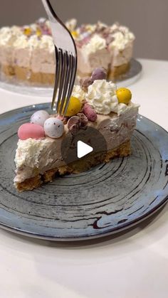 a piece of cake on a plate with a fork stuck in it and an easter egg decoration