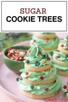 sugar cookie trees with green frosting and sprinkles on a pink plate