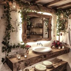 the bathroom is decorated in rustic style with flowers and greenery on the wall above the sink