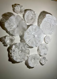 a group of glass pieces sitting on top of a table