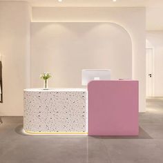 a white and pink counter in a room