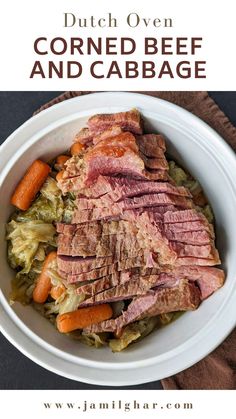 corned beef and cabbage with carrots in a white bowl on a brown cloth