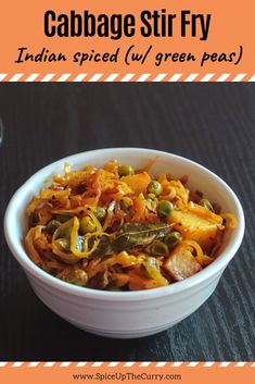 a white bowl filled with food on top of a table