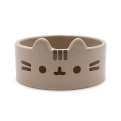 a cat shaped bowl is shown on a white background