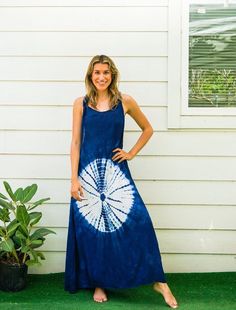 Embrace the summer with this Shibori Indigo Hand Dyed Dress. Ideal for beach outings, lounging at home, or casual summer wear, this dress is handmade from soft and comfy 100% rayon. With an adjustable racerback style, it offers a flexible fit for various body types.  Key Features * Material: Soft and comfy 100% rayon * Style: Adjustable racerback knot dress * Design: Hand-dyed Shibori pattern in indigo and white * Length: 54 inches from the high point of shoulder to hem * Bust: Fits bust sizes 3 Dress Loungewear, Shibori Pattern, Casual Summer Wear, Indigo Shibori, Knot Dress, Fitting Dress, Loose Fitting Dresses, Dyed Dress, Beach Wear