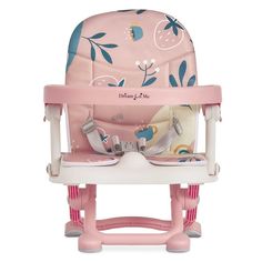 a pink high chair with blue and white flowers on it's seat, in front of a white background