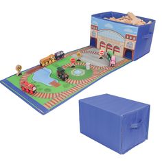 a toy train set and play mat on a white background