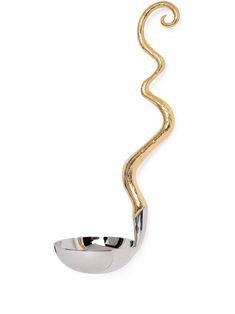 a gold and silver object with a spiral design on the top, in front of a white background