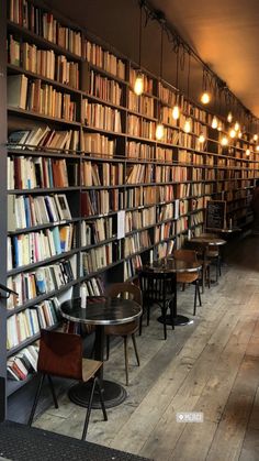 a long row of bookshelves filled with lots of books