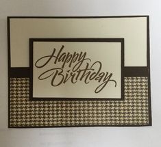 a card with the words happy birthday written on it, and a houndskin pattern