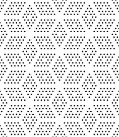 a black and white pattern with small dots