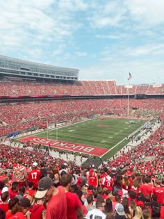 a football stadium filled with people and fans