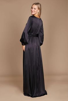 Are you trying to find the ideal long dress that will make you feel both gorgeous and at ease? Check out this gorgeous long-sleeved formal dress! It has a chic split a-line skirt that will accentuate your attractive legs, a trendy and elegant peplum-style bodice, and romantic long sleeves. Elegance, beauty, and comfort are personified in this outfit. Excellent for any special event! Fabric: Satin Length : Full Length Sleeve Style : Long Sleeve Color : Black, Navy Sizes : 8, 10, 12, 14, 16, 18, 2 Sleek Long Sleeve Formal Maxi Dress, Elegant Full Length Maxi Dress For Prom Season, Elegant Full-length Satin Maxi Dress, Elegant Full Length Maxi Dress For Prom, Elegant A-line Maxi Dress For Dinner, Solid Color A-line Long Sleeve Party Dress, Elegant Long Maxi Dress For Fall, Fall Elegant Maxi Dress, Formal Sleek Long Sleeve Fall Dress