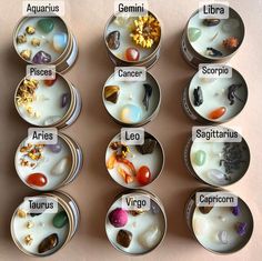 there are seven different types of gems in their bowls and labeled with the names on them