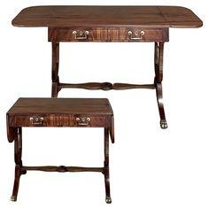 two wooden tables with drawers on each side