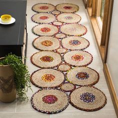 the rugs on the floor are made from woven material