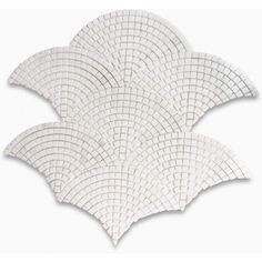 four white tiles are arranged in the shape of petals