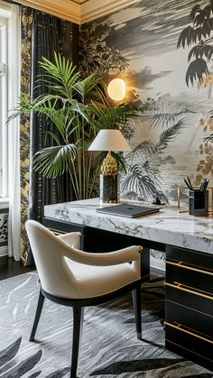 a desk with a chair, lamp and potted plant in front of a window