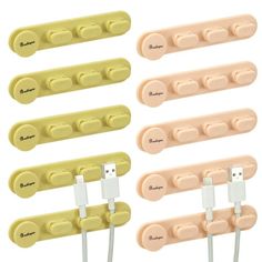 four different colored plugs and wires attached to each other