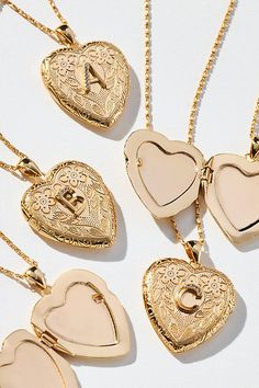 Fancy this: the season’s most treasured giftables. A monogram moment stands out on this functional locket, delicately detailed with a floral design. | Monogram Heart Locket Necklace by Anthropologie in Alphabet, Women's, Gold/Plated Brass Cute Necklaces Aestheti, Cute Rose Gold Necklace, Gold Heart Necklace Wallpaper, Small Heart Necklaces, Mom Jewelry Personalized Necklace, Cheap Locket Jewelry As A Gift, Cheap Women's Necklace For Birthday Gift, Cheap Locket Jewelry For Mother's Day, Great Women Gifts