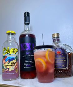 several different types of alcoholic beverages on a counter