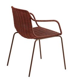 a brown wicker chair sitting on top of a metal frame